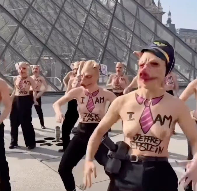 Femen stages topless protest in Paris for International Women’s Day